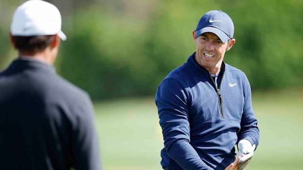 Rory McIlroy uses the practice area prior to the 2024 Players Championship at TPC Sawgrass in Ponte Vedra Beach, Fla.